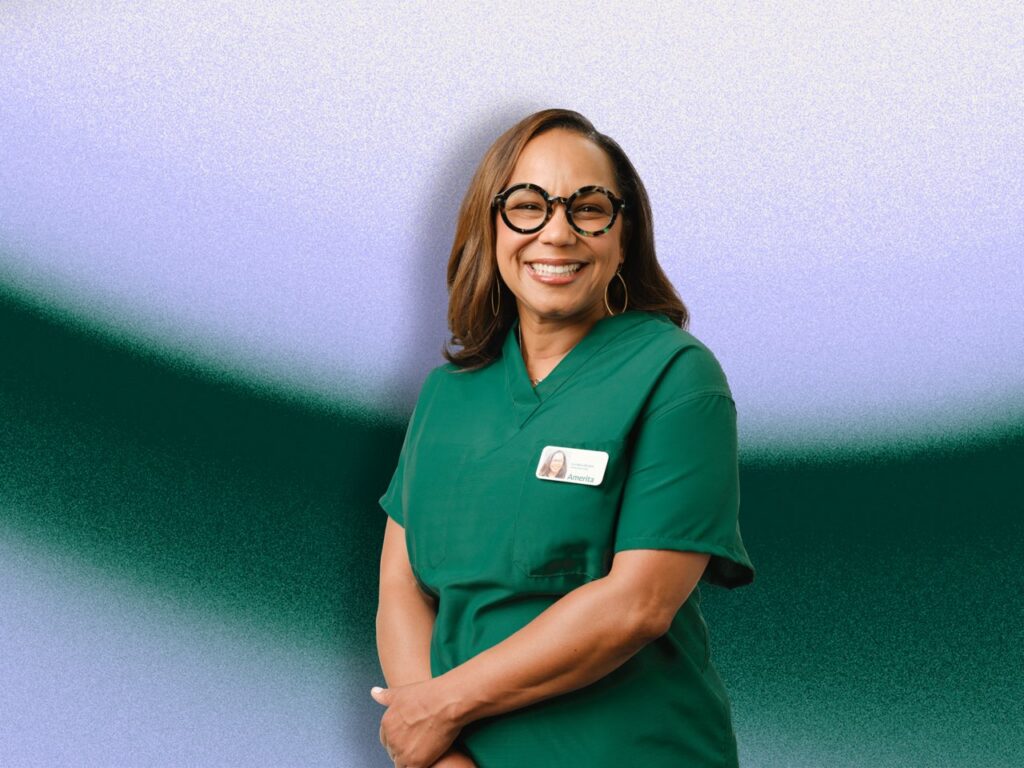 A nurse in Amerita Green scrubs