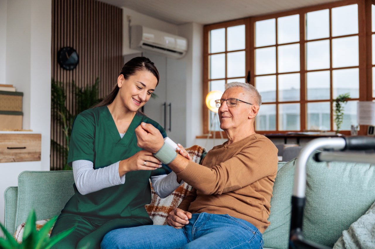 A nurse checking on a patient